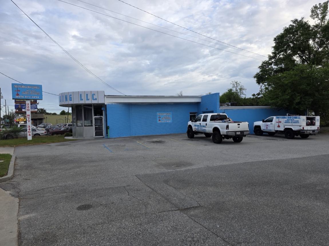 Tison's Plumbing & Drain Cleaning LLC shop and work trucks